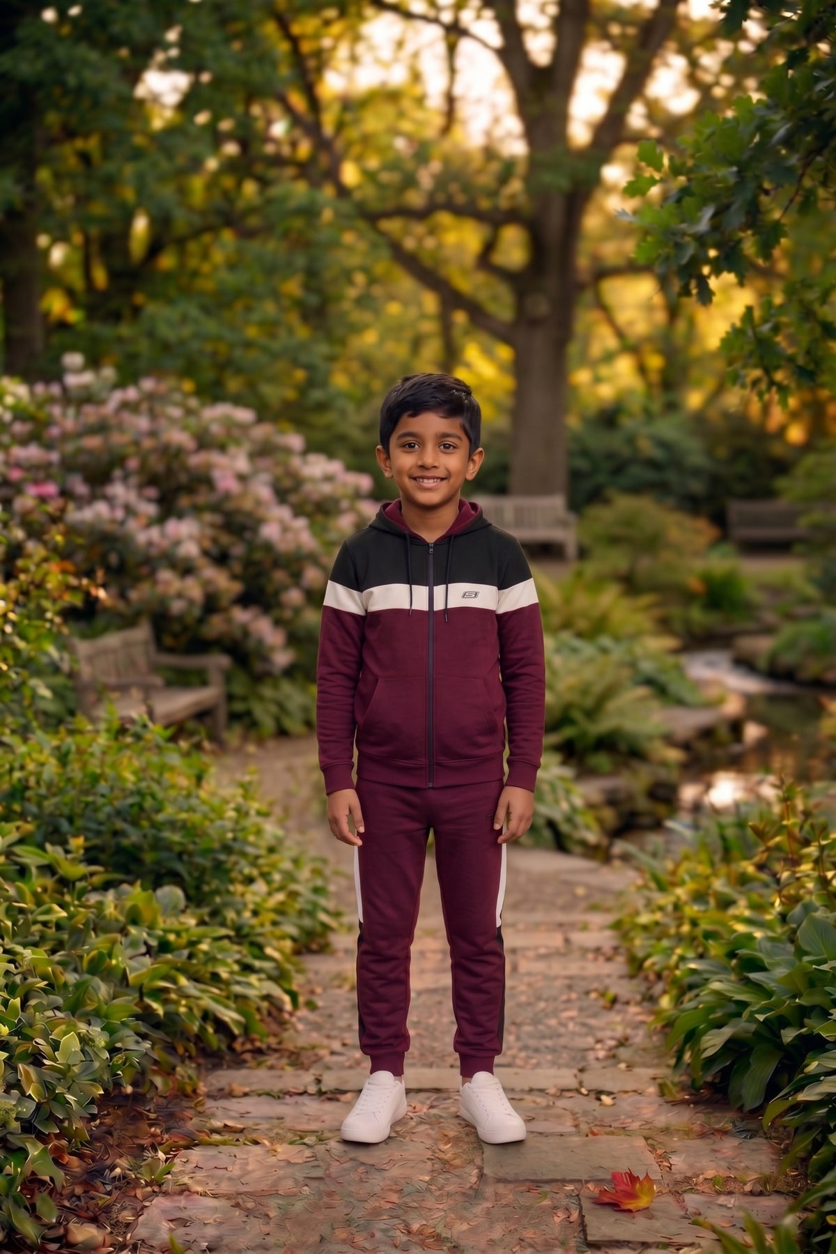 Kid's Kid's Only premium tracksuit in maroon, black, and white with a comfortable fit and stylish design.