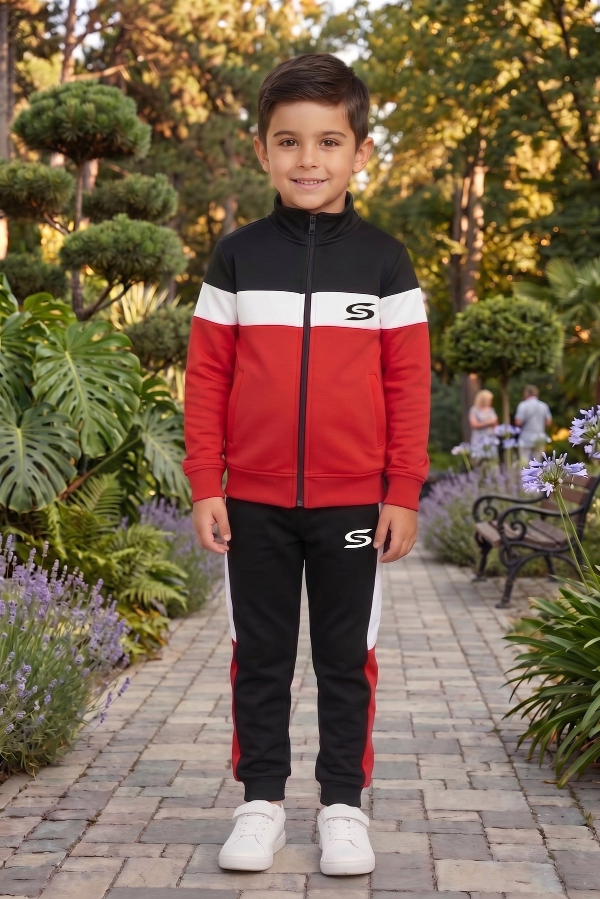Kids' tracksuit in red, black, and white with a mock neck, made by Kid's Only, featuring premium fabric and stylish design.