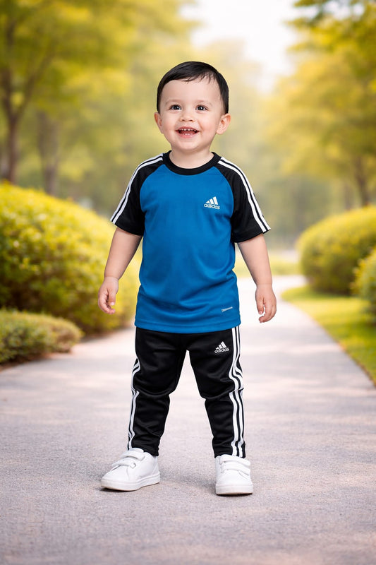 Superwear Kid's Dry-Fit Tracksuit in Peacock Blue and Black, featuring a comfortable sporty design for children.